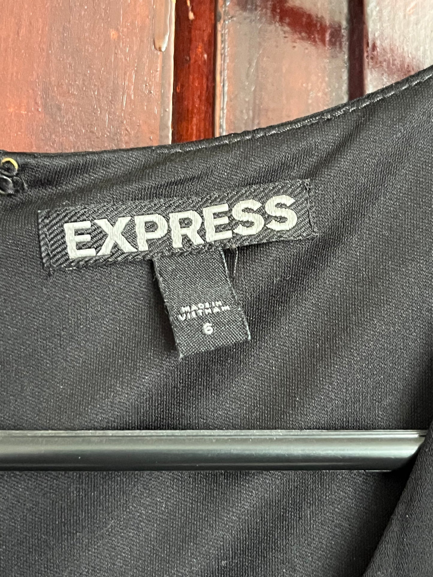 Seller #13 Express Women’s size 6 romper