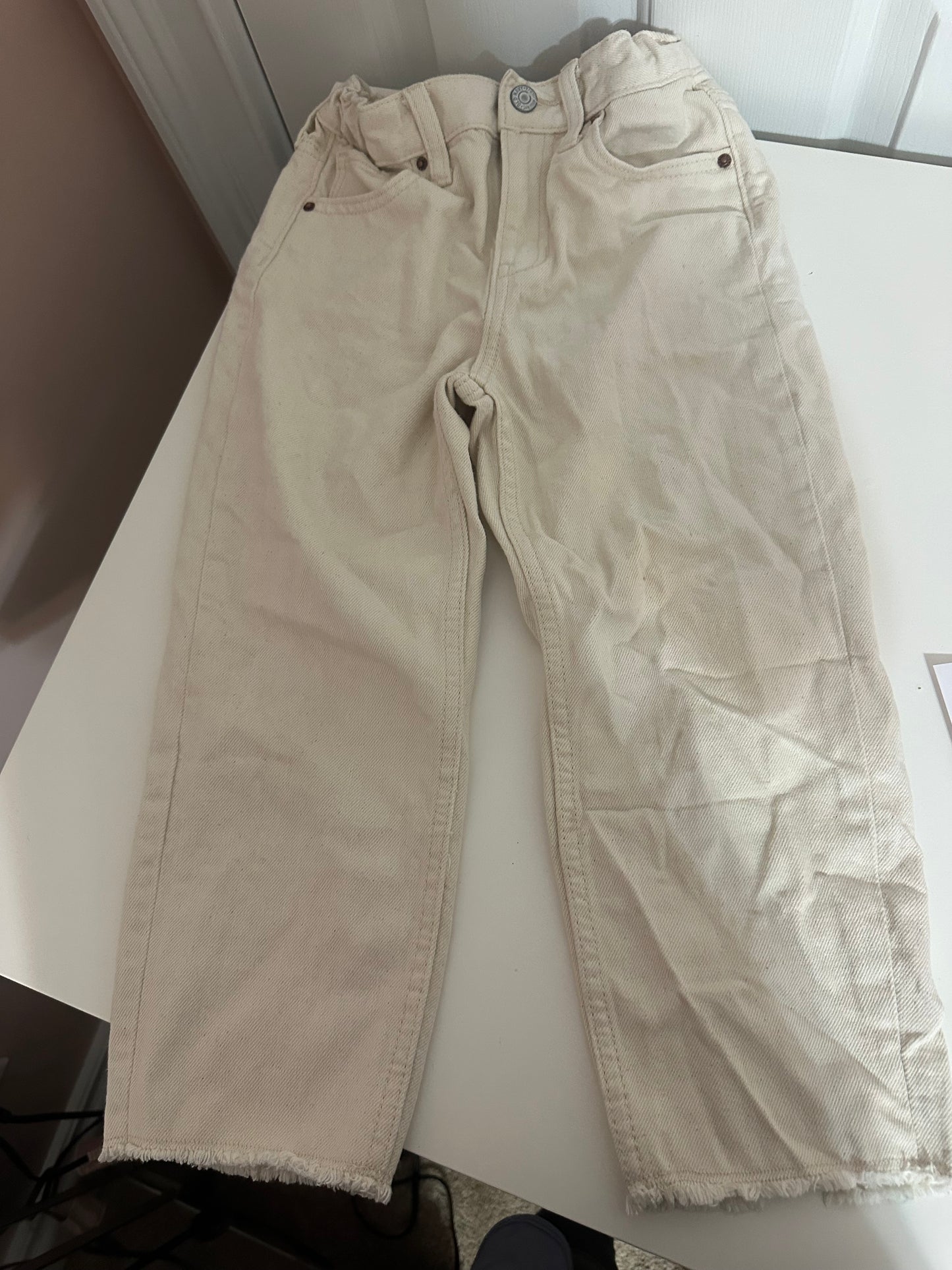 #23 girls cream colored jeans size 6