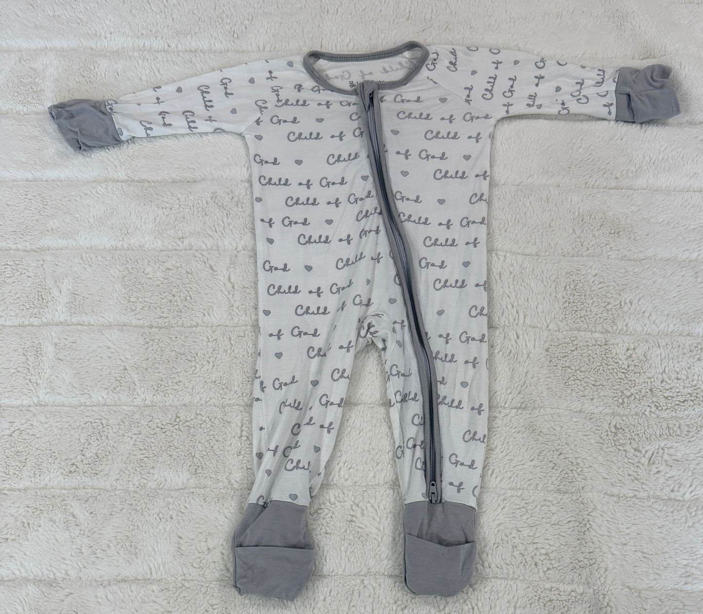 #56 REDUCED baby “Child of God” zippy size 0-3 months