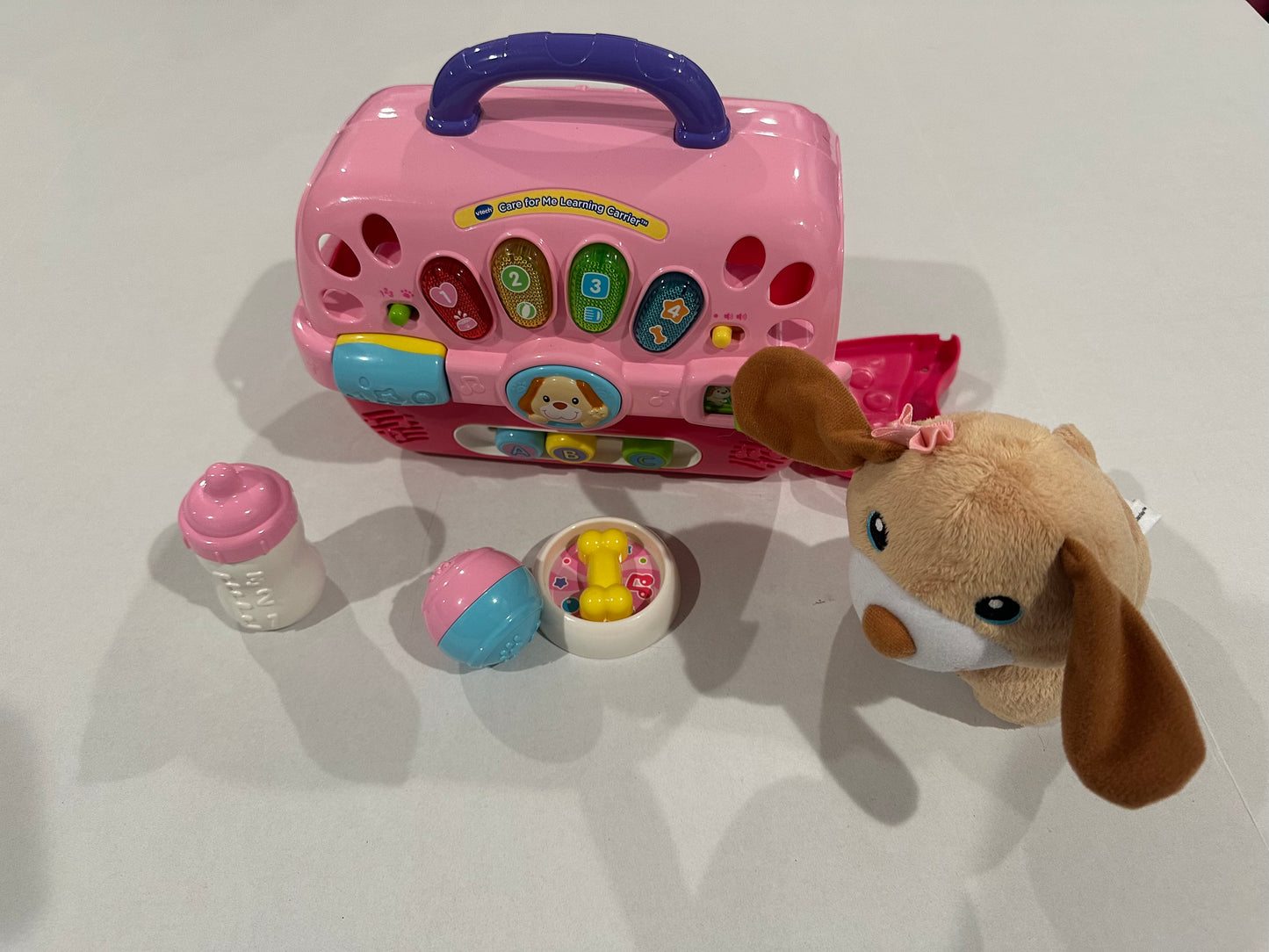 #160 Vtech care for me learning center dog carrier - lights up and talks