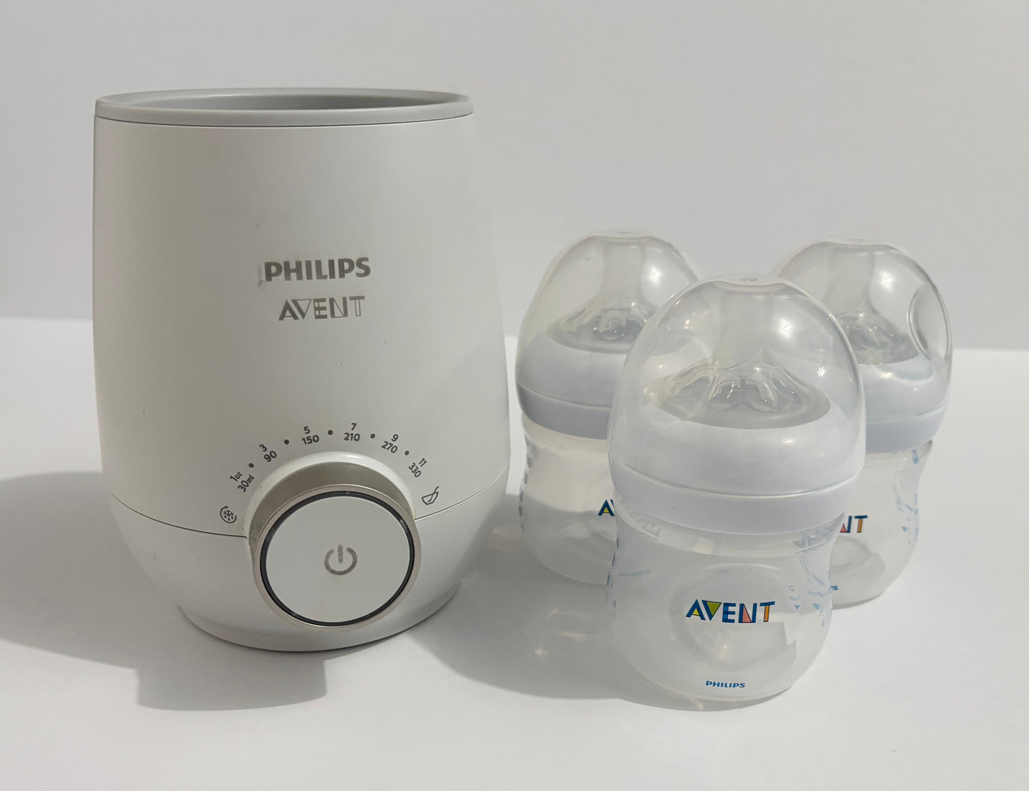 #132 - REDUCED- Bundle of Phillips Avent: Bottle Warmer and 3 Natural Baby Bottles with Size 1 Natural Response Nipples - 4oz