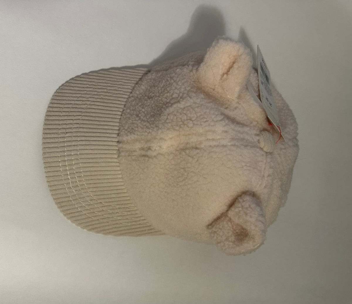 Seller 182. Off white fuzzy bear hat. NWT