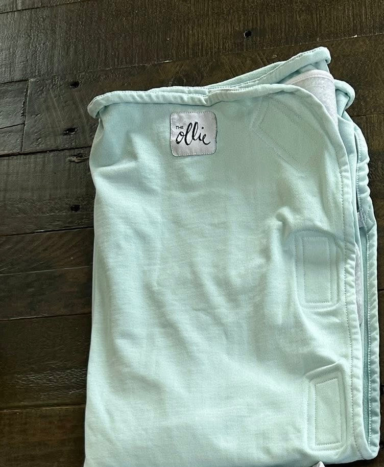 # 17 REDUCED Ollie Infant Swaddle Light Seafoam Green