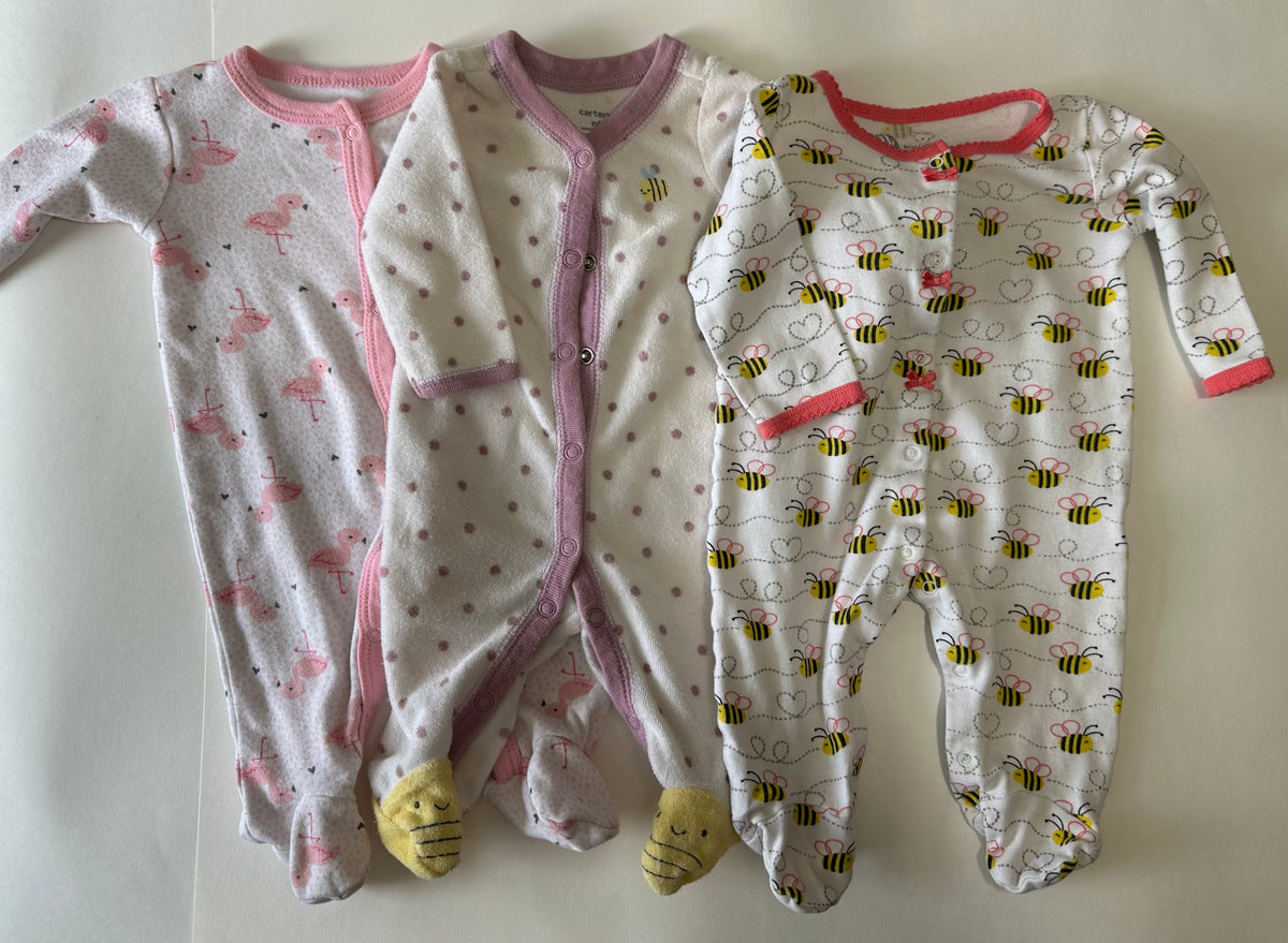 Seller 182. Buttons up newborn sleepers.