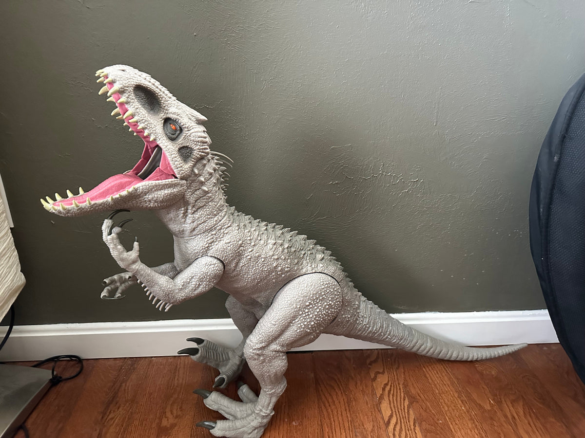 Seller 182. Dinosaur 3.5 ft long, eating feature.