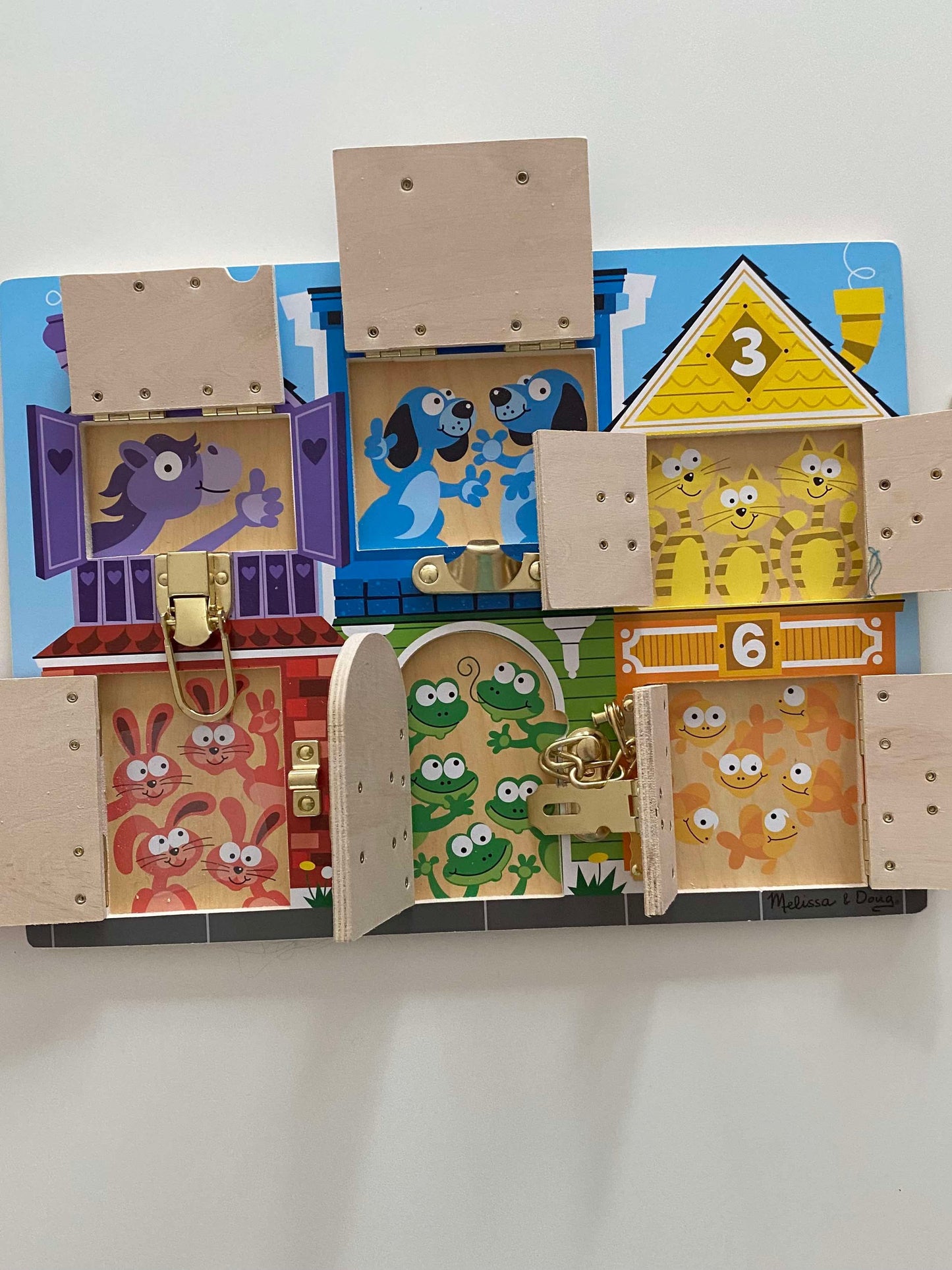 #117, Melissa & Doug wooden latch board puzzle, EUC