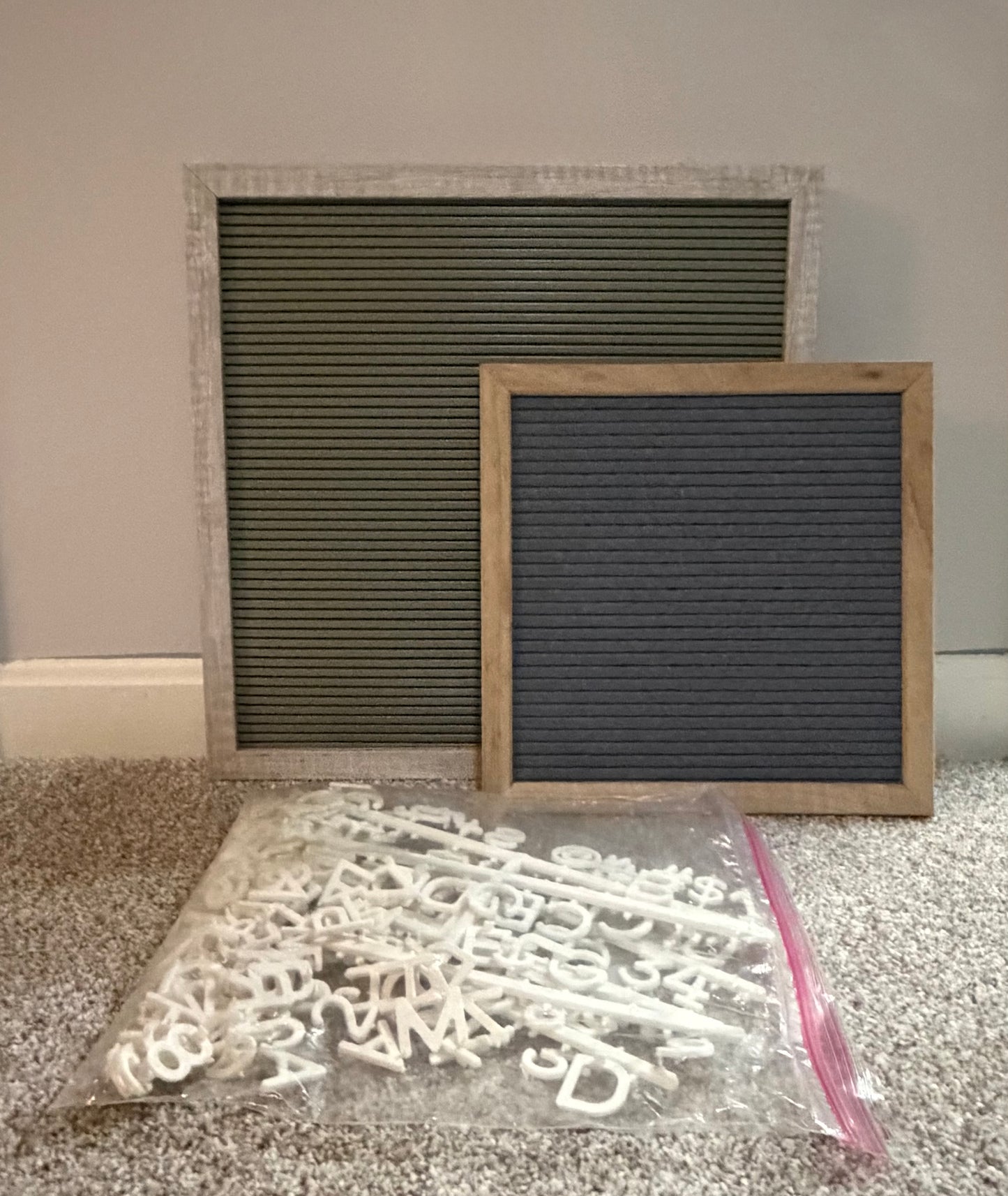 2 letter boards with bag of letters