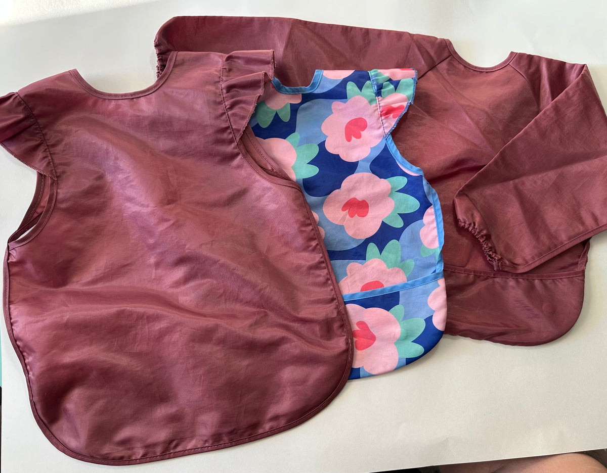 Seller 182. Tiny twinkle bibs.