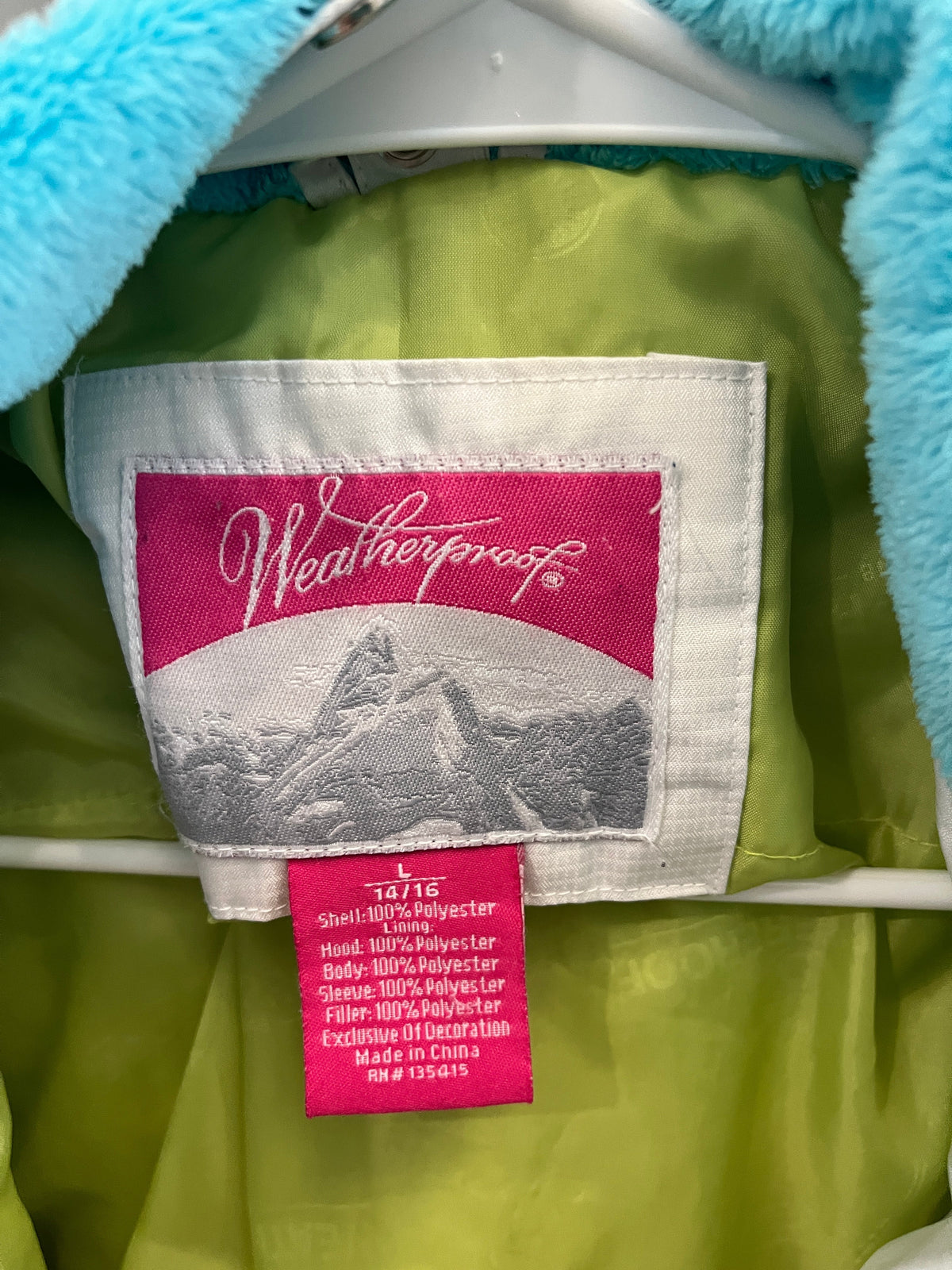 135 Girls white, turquoise, and green winter coat Size L 10/12 Weatherproof brand (see pictures for dirt mark on sleeves)