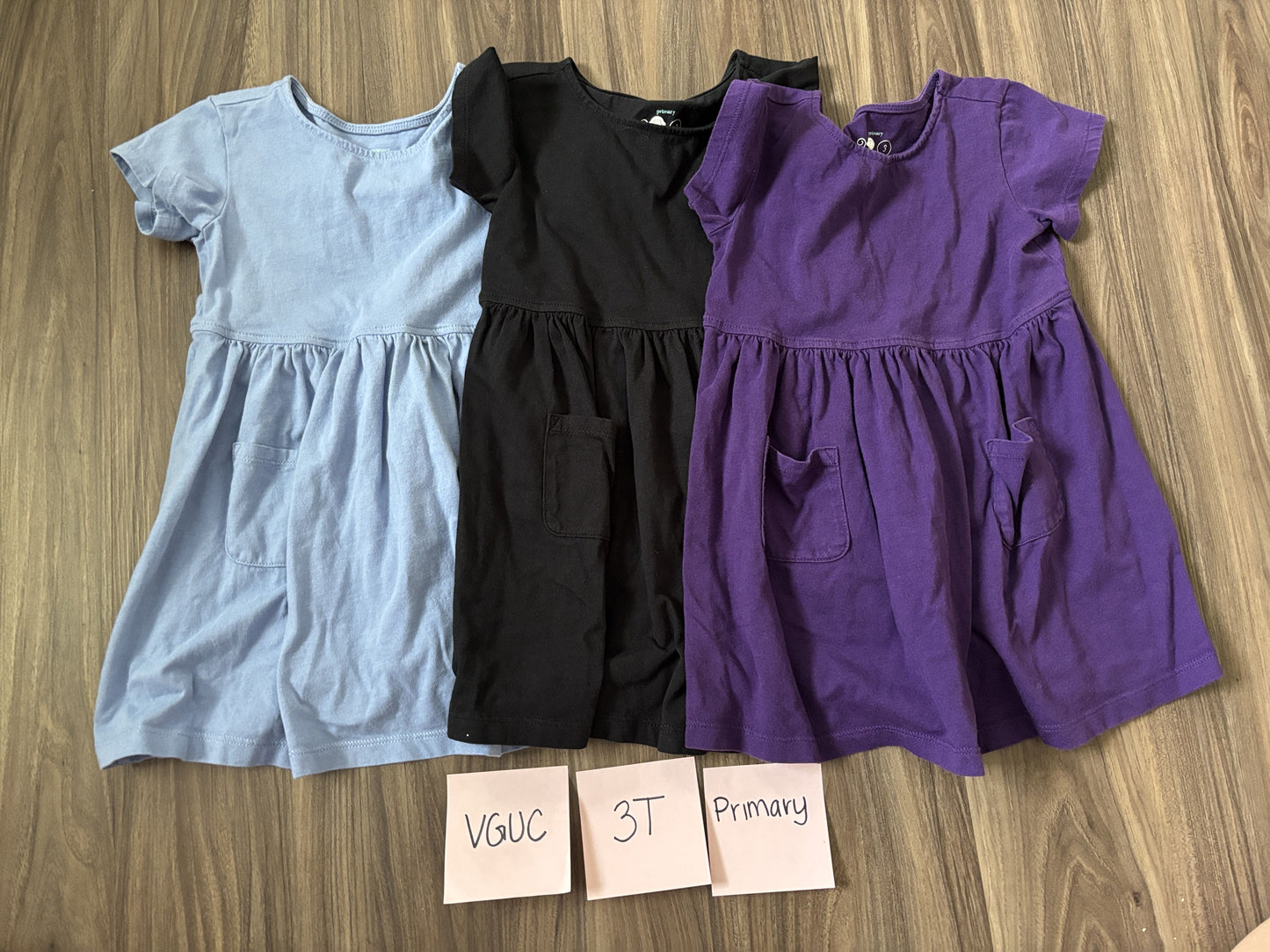 #138 - 3T VGUC Primary (3) Dresses (blue, black, purple)