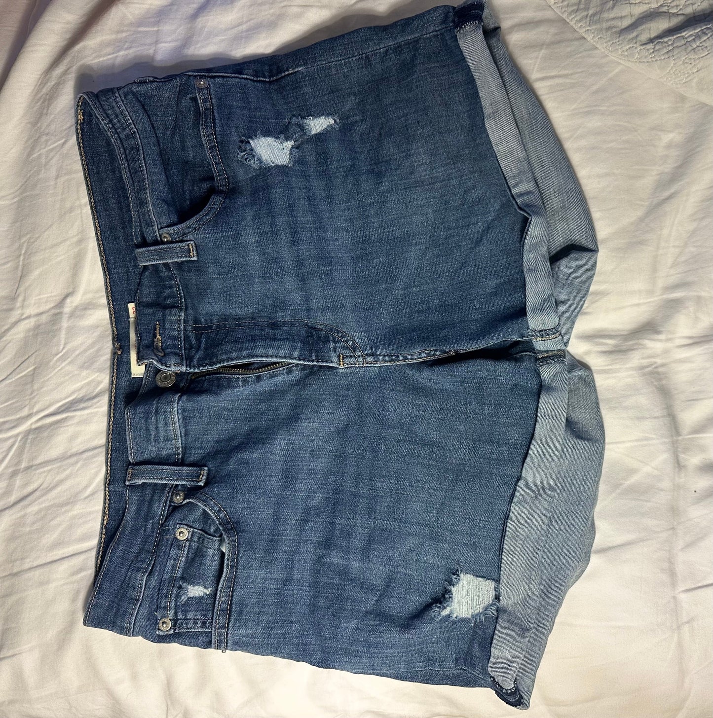 Seller #51: Levi Jean shorts - women size 32