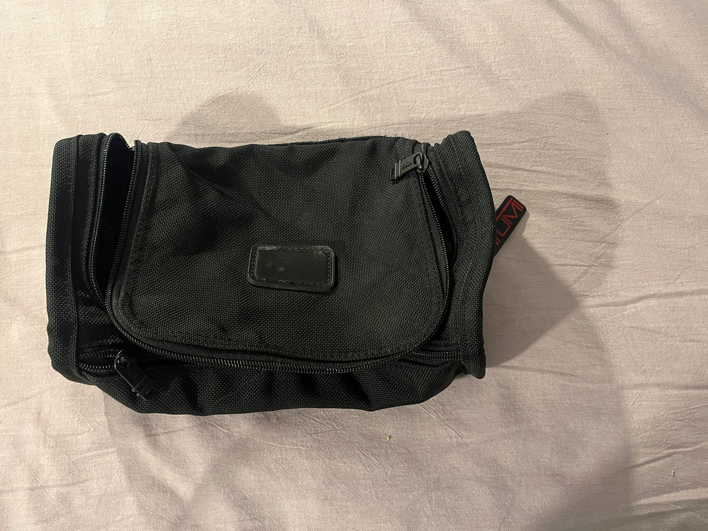 #211 Mens Tumi Toiletry Bag