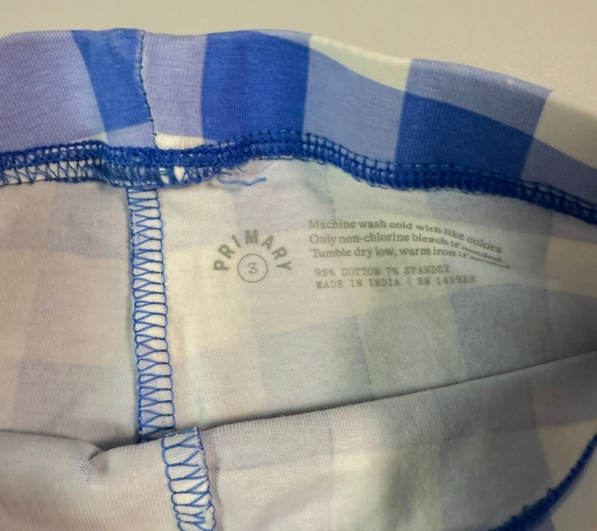 #155 Primary girls blue and white check leggings, size 3T