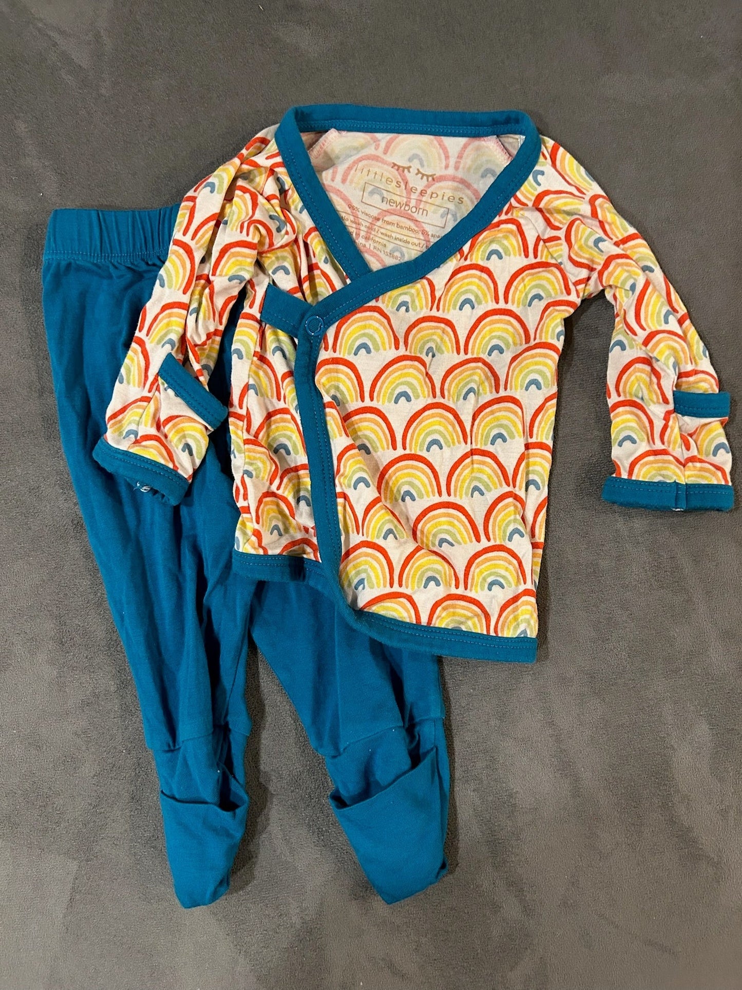 Seller 128 - Little Sleepies Primary Rainbows Newborn Crossover Set
