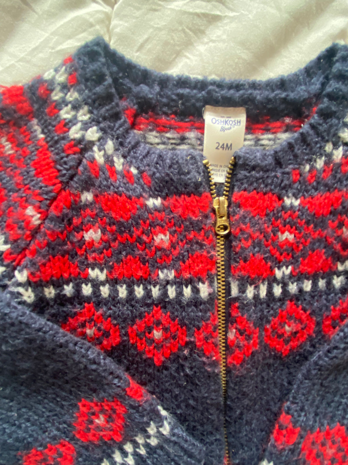 Seller 59 Osh Kosh girls 24 mo navy and red sweater