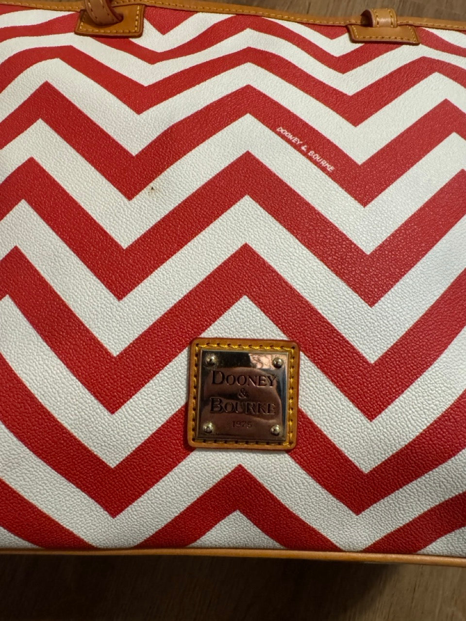 Seller #114 Dooney and Bourke leather orange and white chevron tote