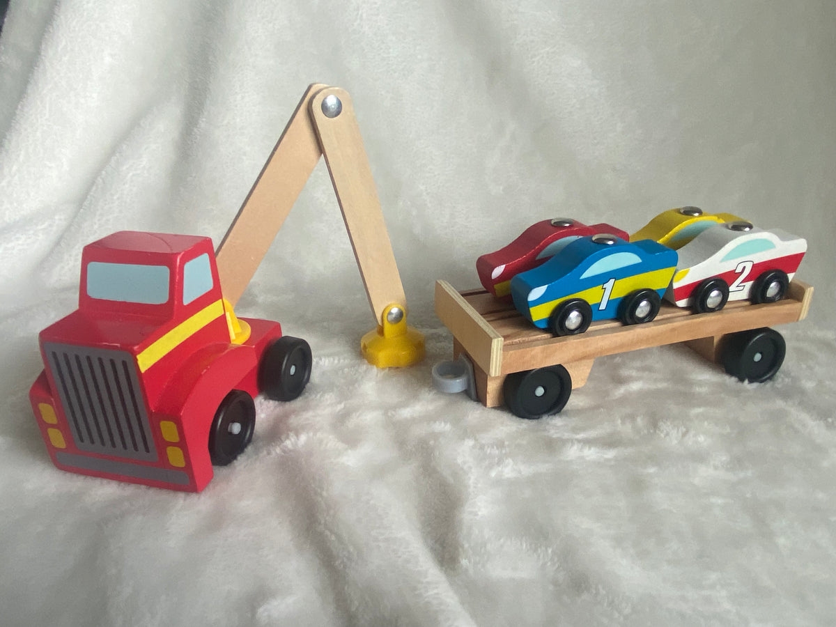 Seller 59 Melissa and Doug magnetic race car/car transporter