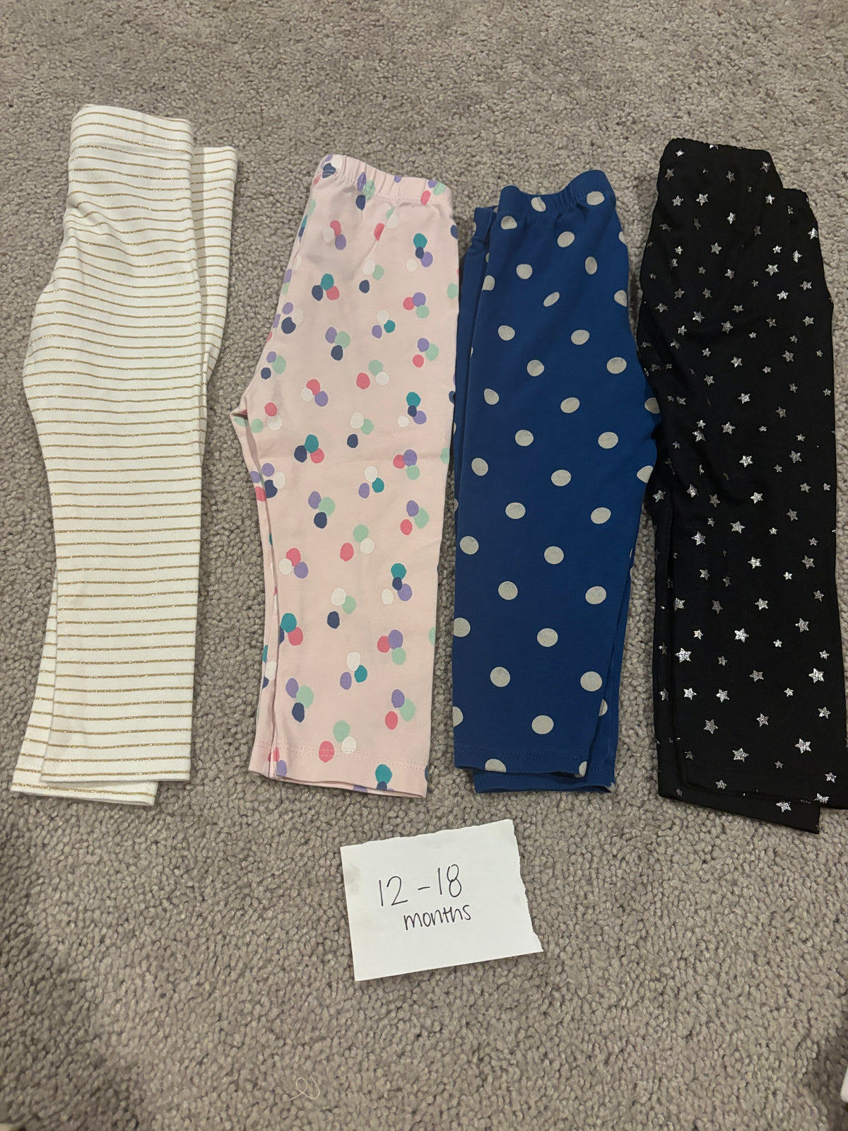 #138 - 12-18 Mo VGUC (4) Leggings (white stripe, pink dot, blue dot, black star)