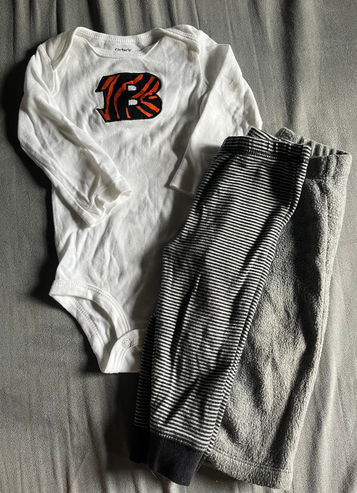 Seller #13 Carter’s boys 9 months Bengals onesie and pants bundle