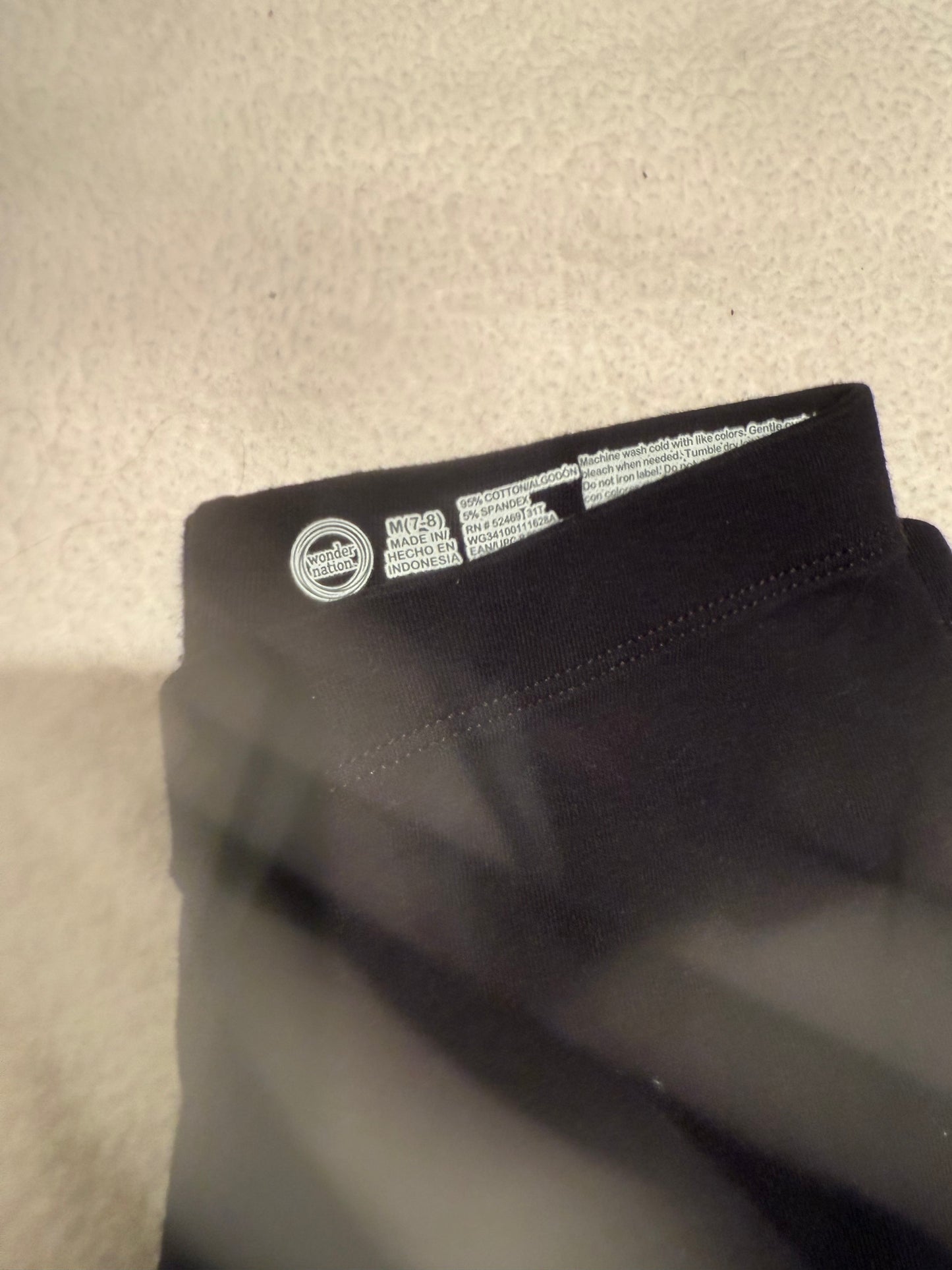 136 EUC black leggings M 7/8