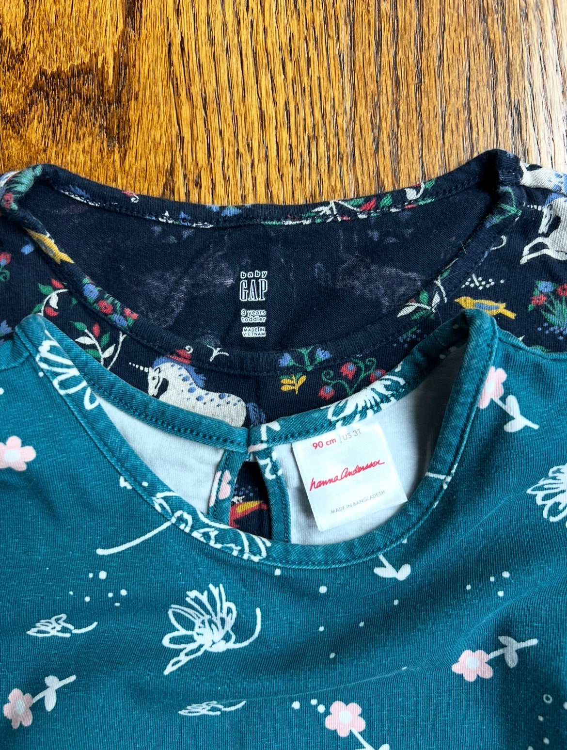 Seller #115 - Baby Gap & Hanna Andersson Girls 3T Tops Bundle (Black/Multicolor Unicorns + Teal Flowers), VGUC