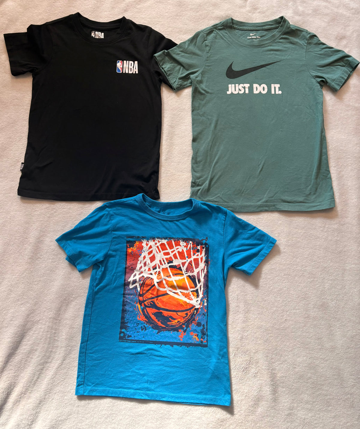 #102 - boys size 8/M assorted sports t-shirts