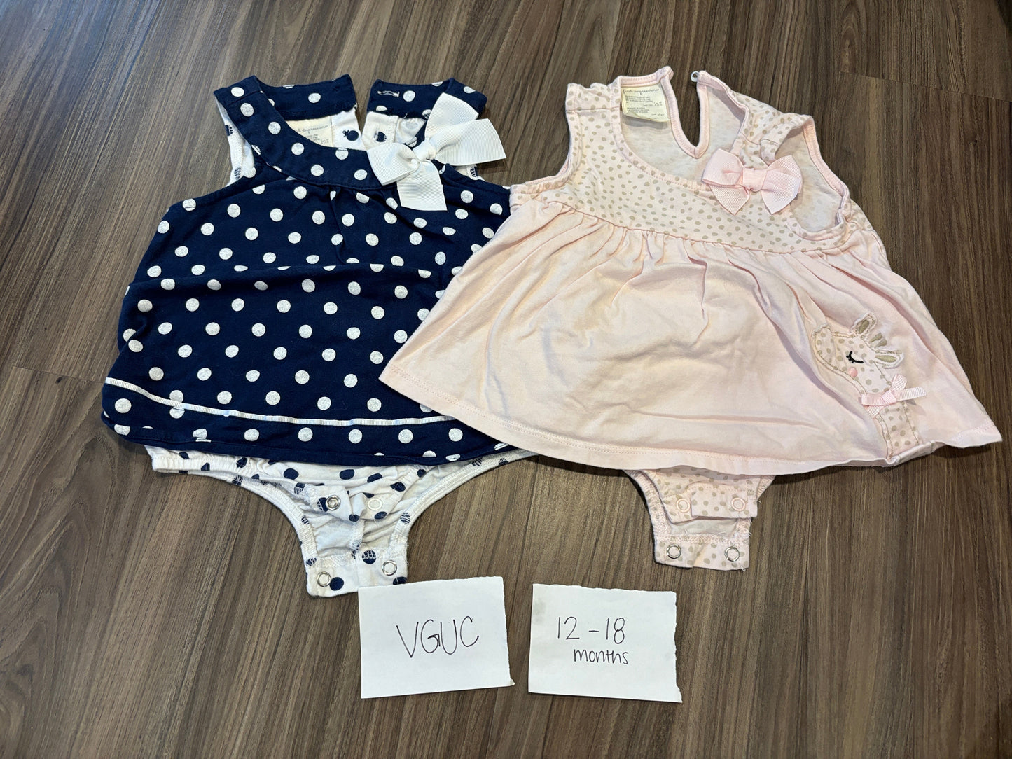 #77 - 12-18 Mo - VGUC First Impressions - 2 Bodysuits (navy dot + giraffe)
