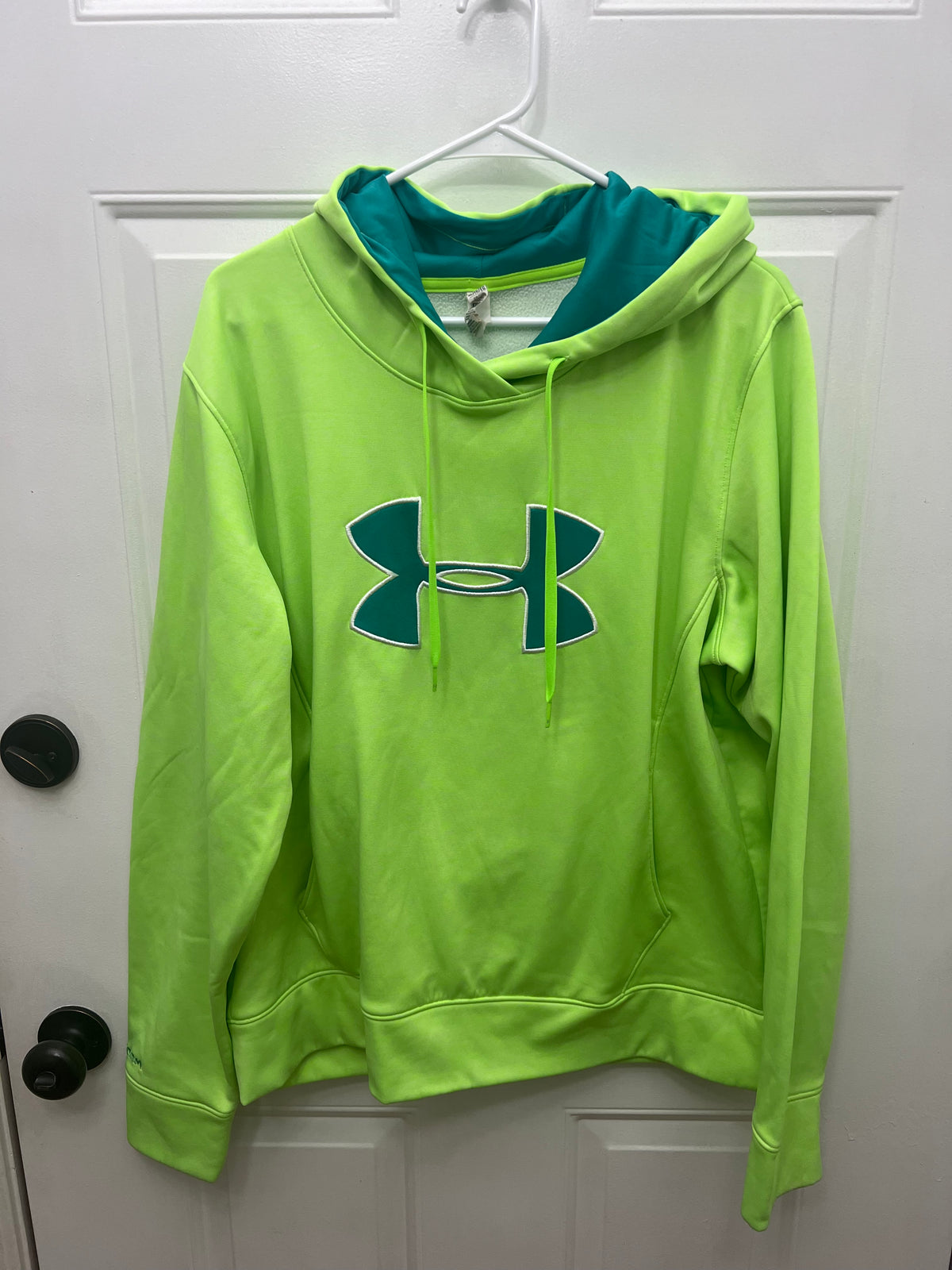 #180 Under Armor Ladies size XL neon hoodie