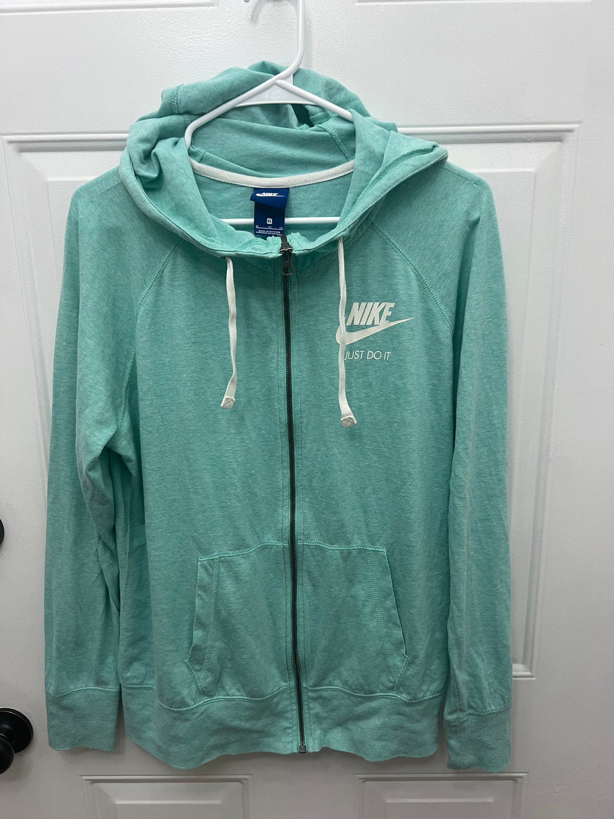 #180 Nike ladies size XL aqua zip up hooded jacket