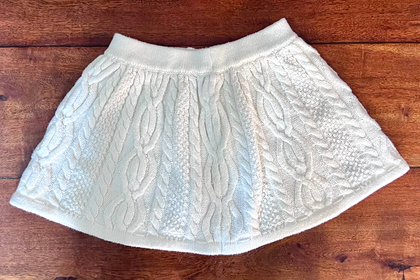 #66 2T cream stretchy cable-knit sweater-material skirt, VGUC