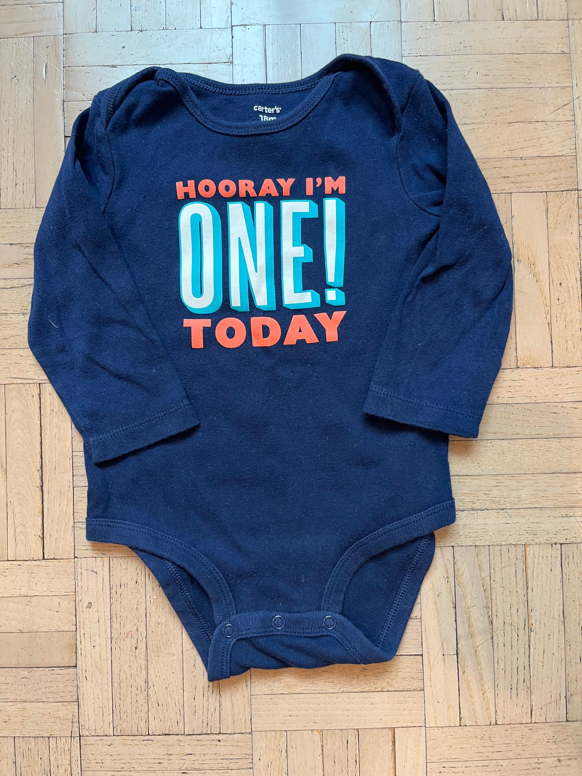 #195 EUC 18 month Carter’s birthday long, sleeved onesie