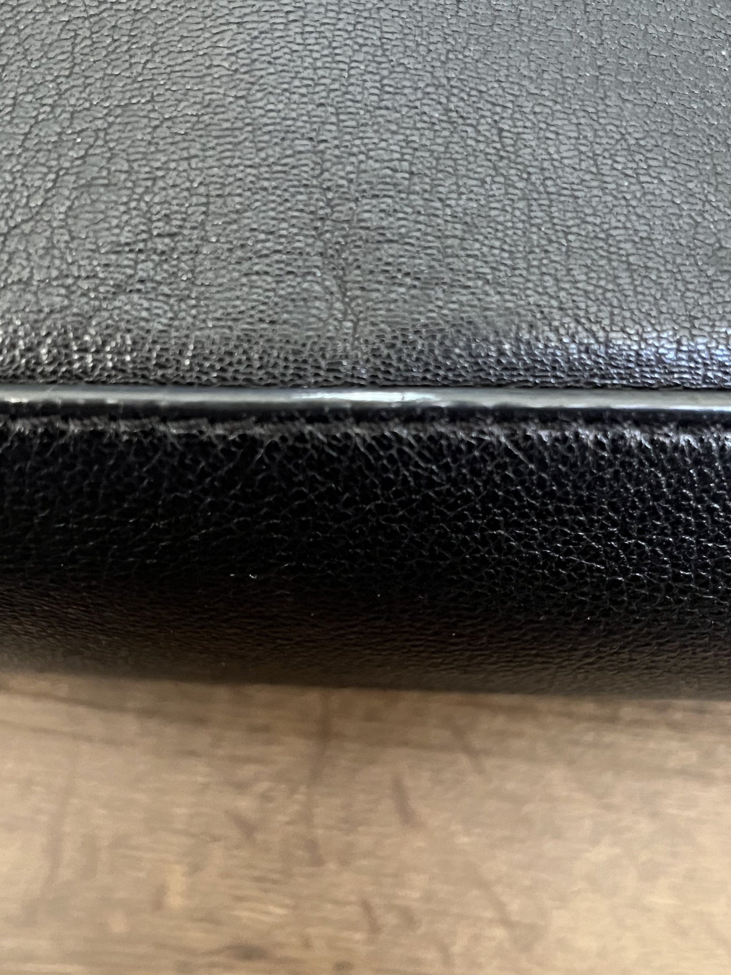 #124 Michael Kors Black Purse with gold accents