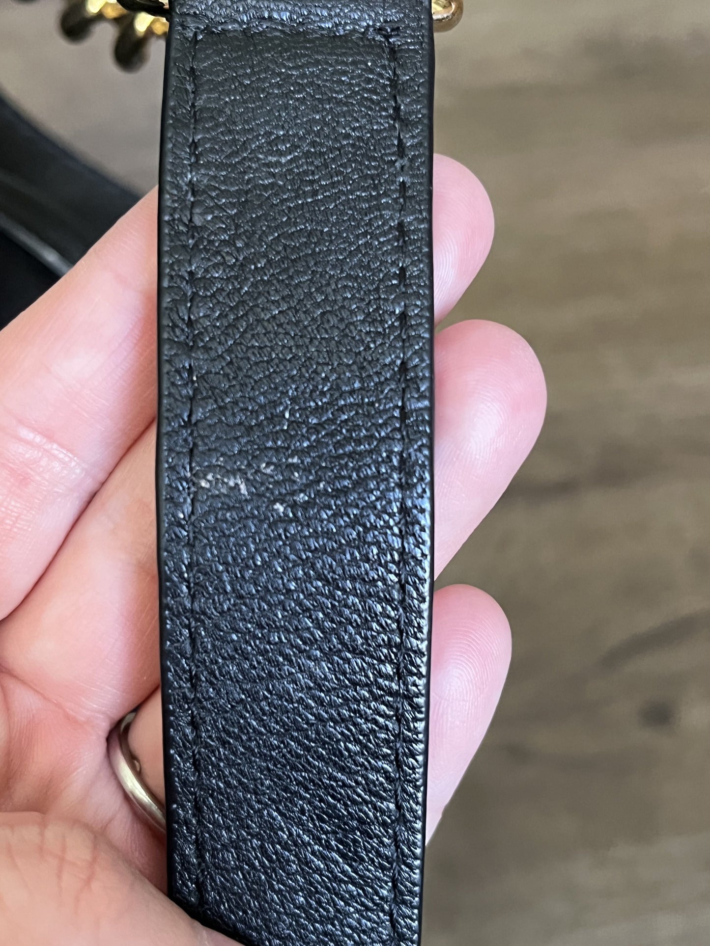 #124 Michael Kors Black Purse with gold accents