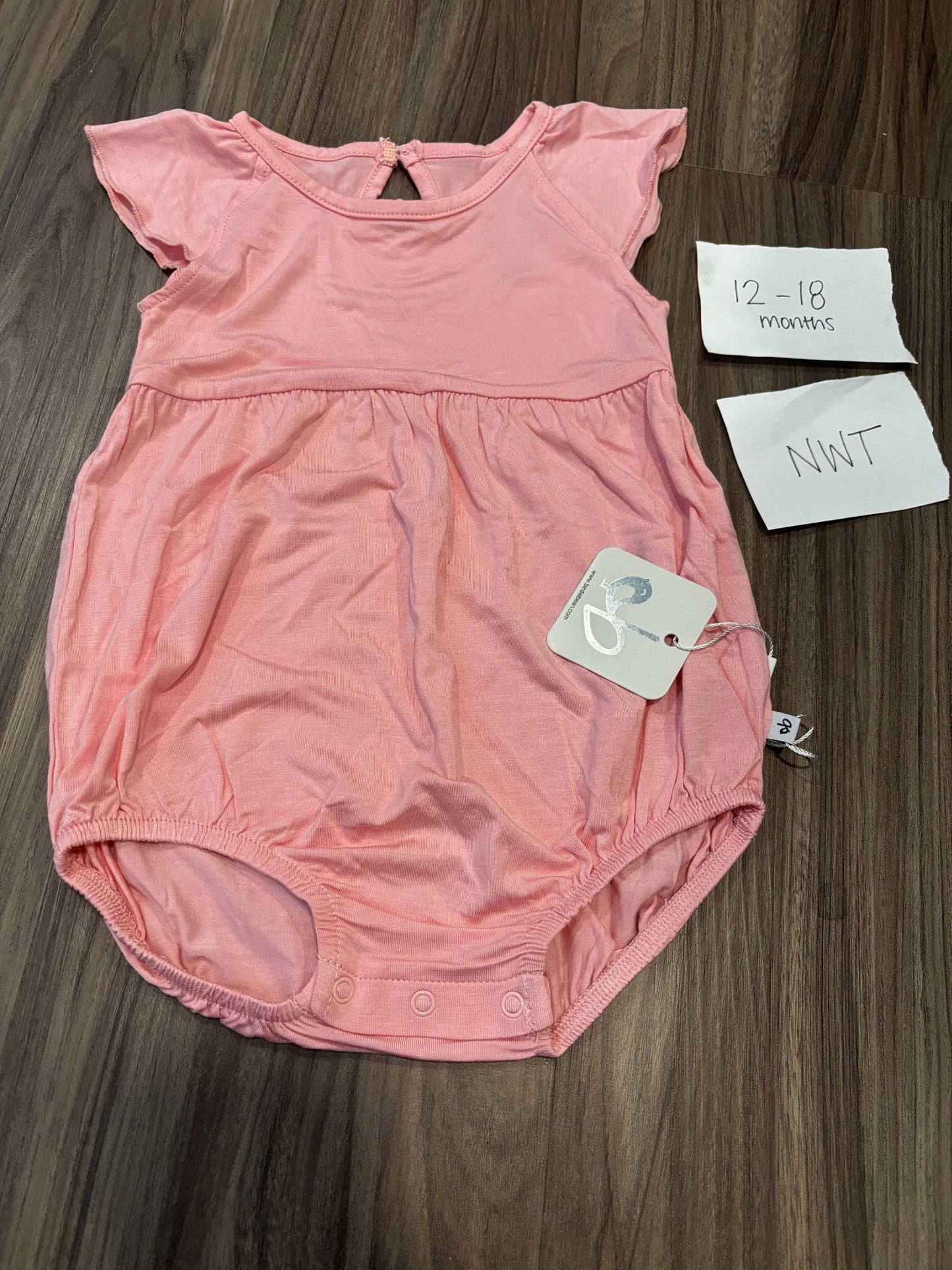 #77 - 12-18 Mo - NWT Birdie Bean - Poppy (solid light pink) Romper