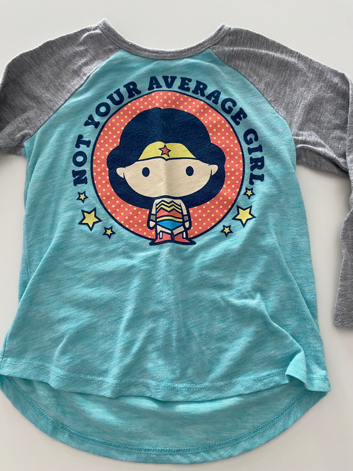 #117-Girls 2T, Jumping Beans ‘Not Your Average Girl’ raglan shirt, GUC