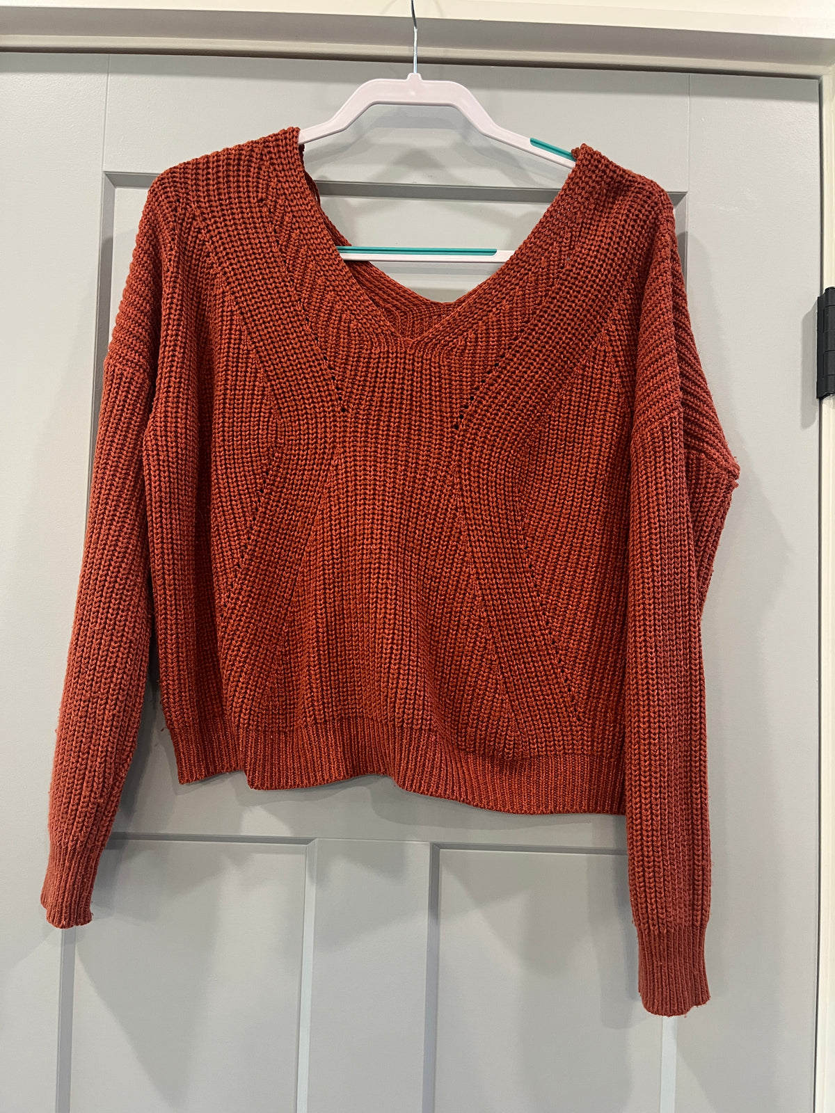 135 Burnt orange vneck sweater, Size L juniors