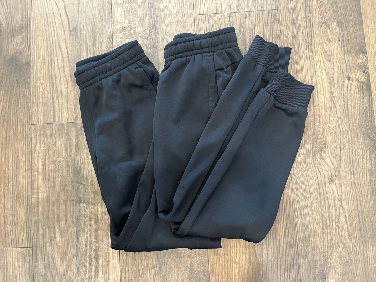 135 Under Armour 2 pairs of black jogger pants size YM, EUC