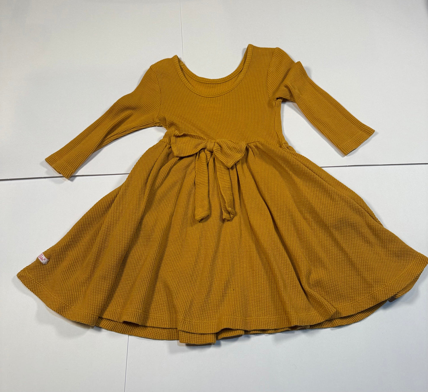 #180 Girls 5 Ruffle Butts Gold Dress with Bow on Back and Pockets