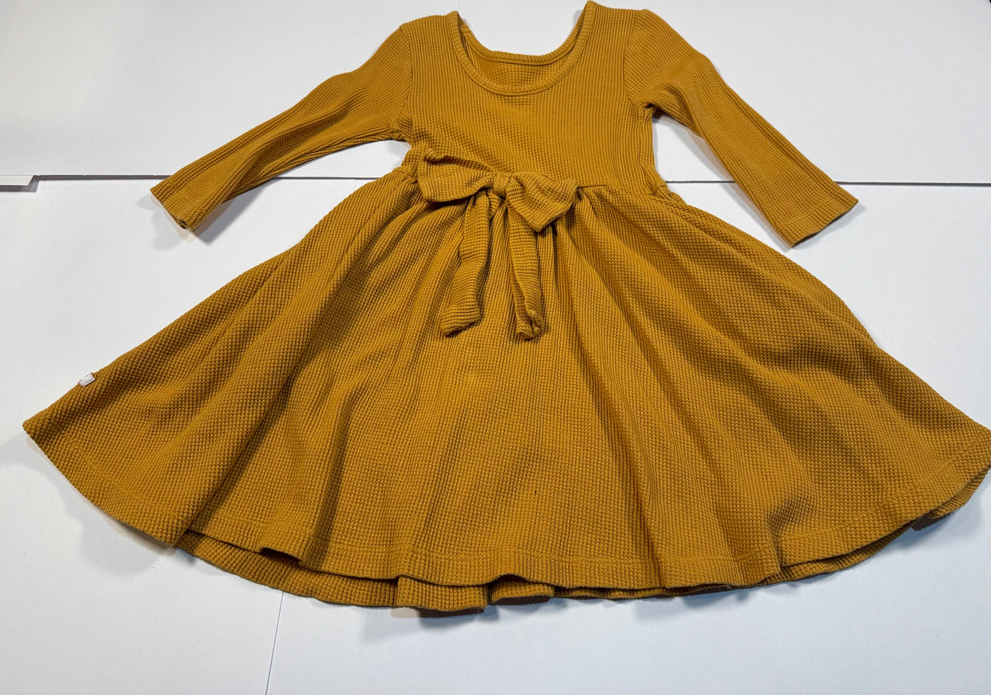 #180 Girls 5 Ruffle Butts Gold Dress with Bow on Back and Pockets