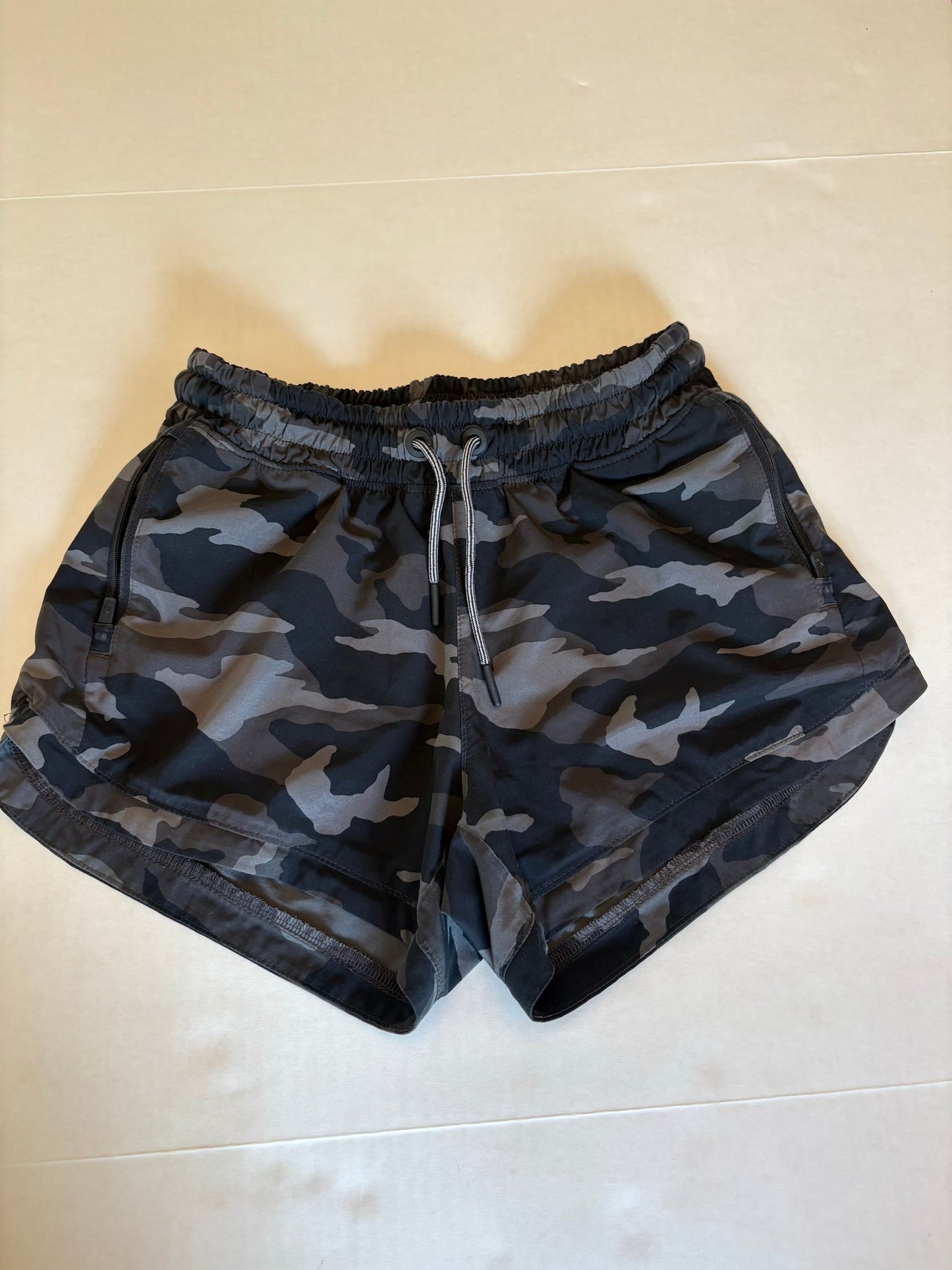 Seller 121 VGUC Athleta Girl camo shorts size 12