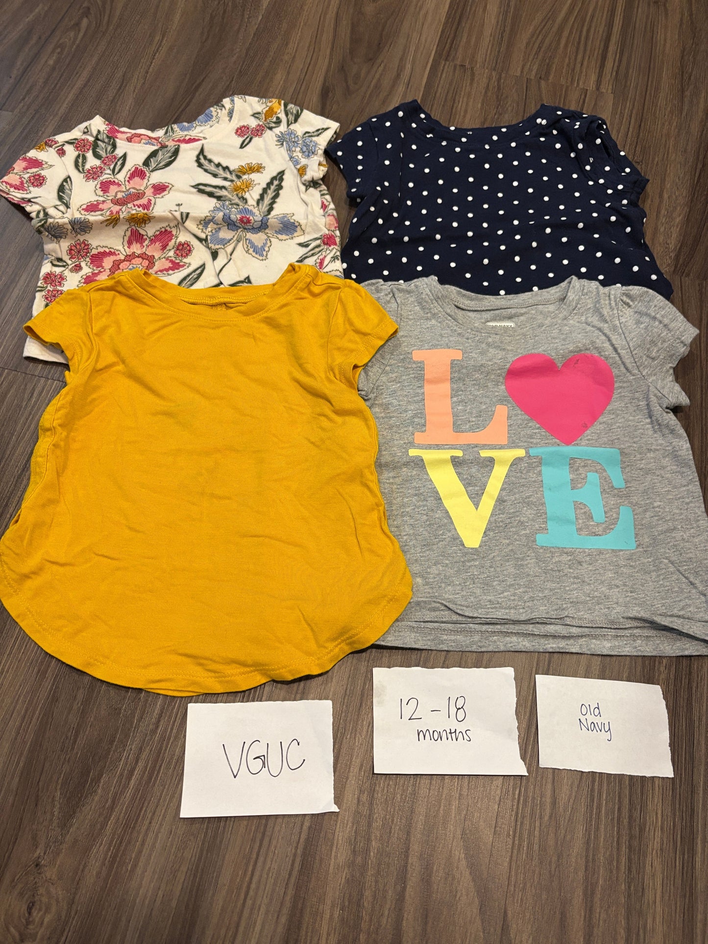 #77 - 12-18 Mo - VGUC Old Navy - 4 Shirts (floral, navy dot, yellow, love)