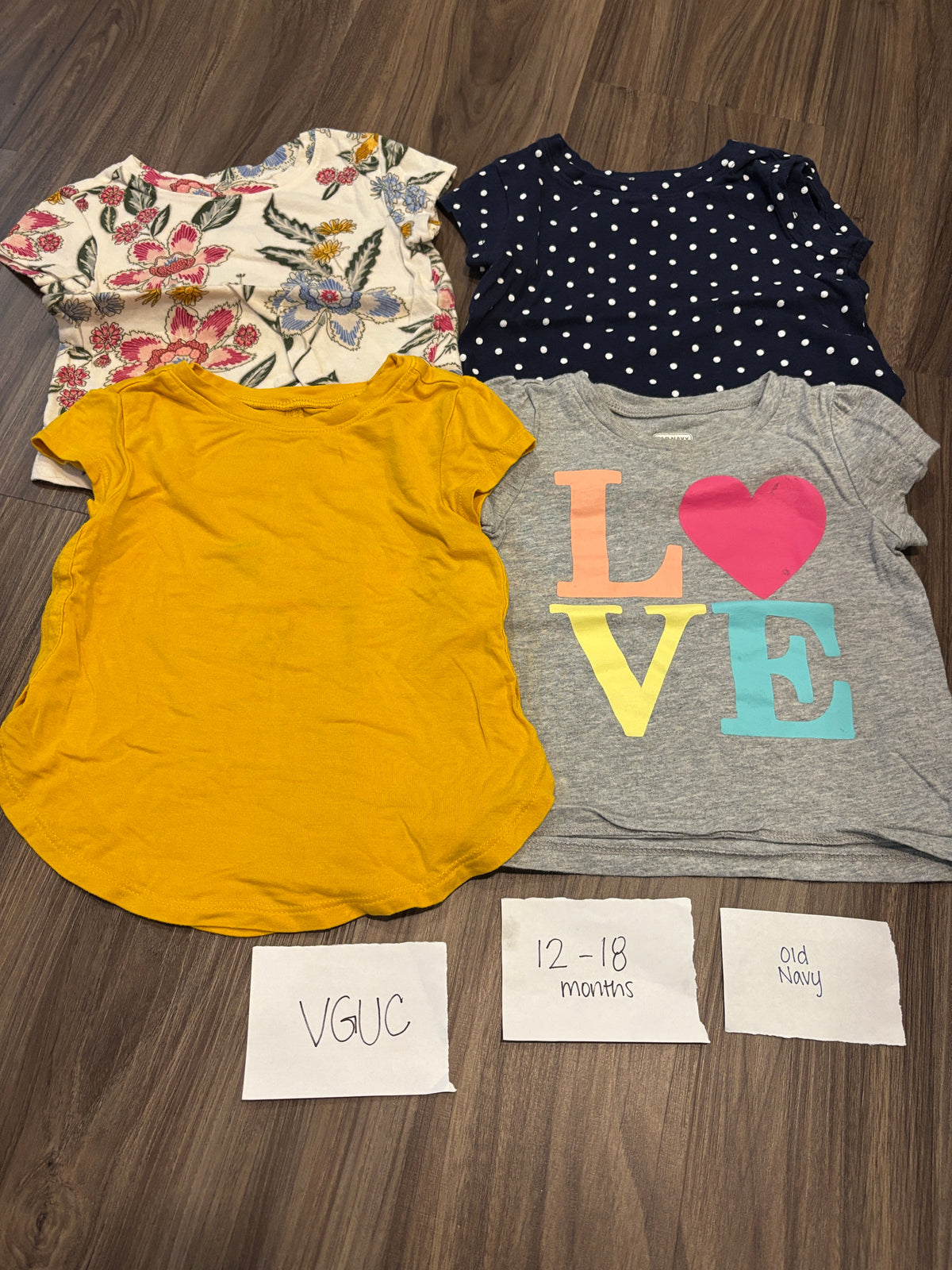 #138 - 12-18 Mo VGUC (4) Old Navy Shirts (floral, navy dot, yellow, love)
