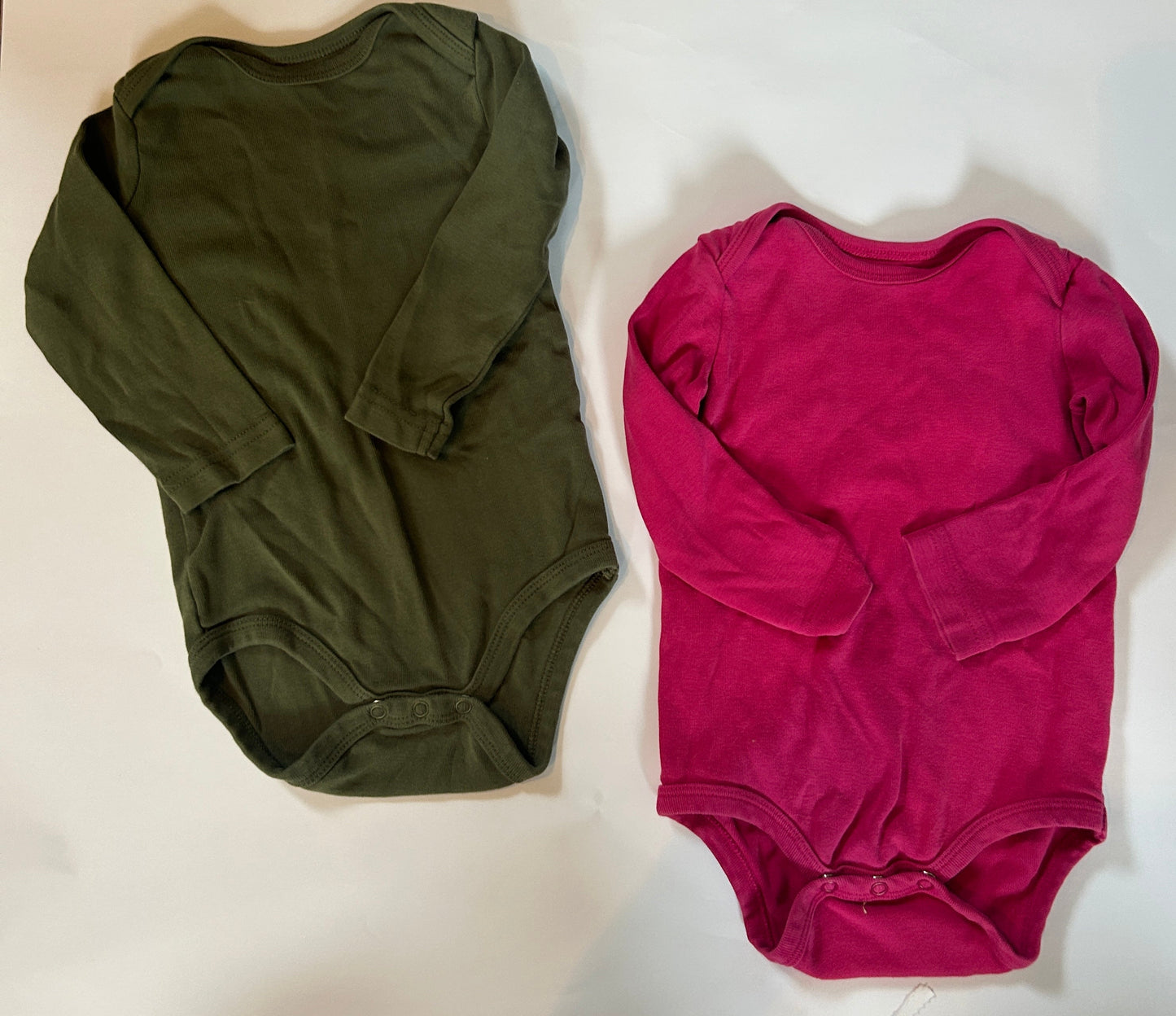 Seller # 35 9-12 month primary onsies