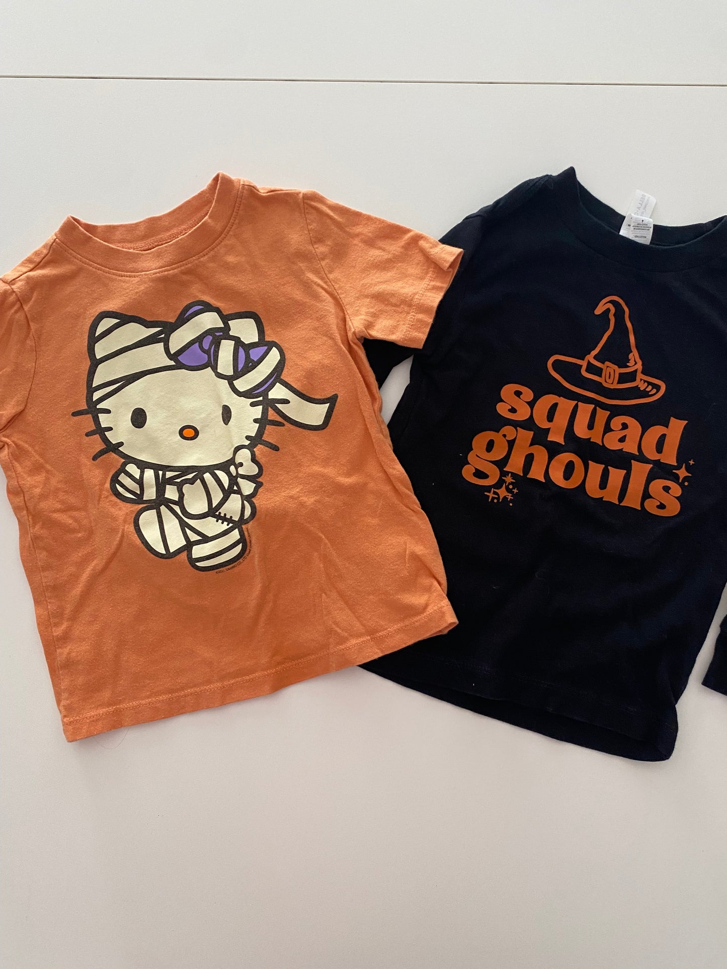 #117- Girls 2T, ON Hello Kitty t-shirt & Boutique black ‘squad ghouls’ shirt, VGUC,*reduced*