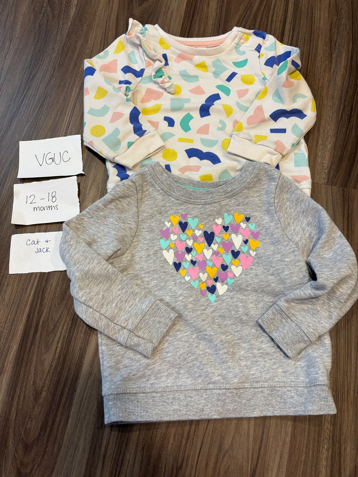 #138 - 12-18 Mo (2) VGUC Cat & Jack Sweatshirts (heart, geometric)