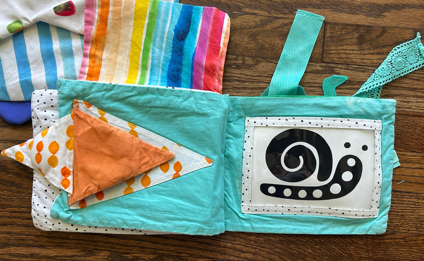 seller #35 lovevery playmat with cards and sensory book