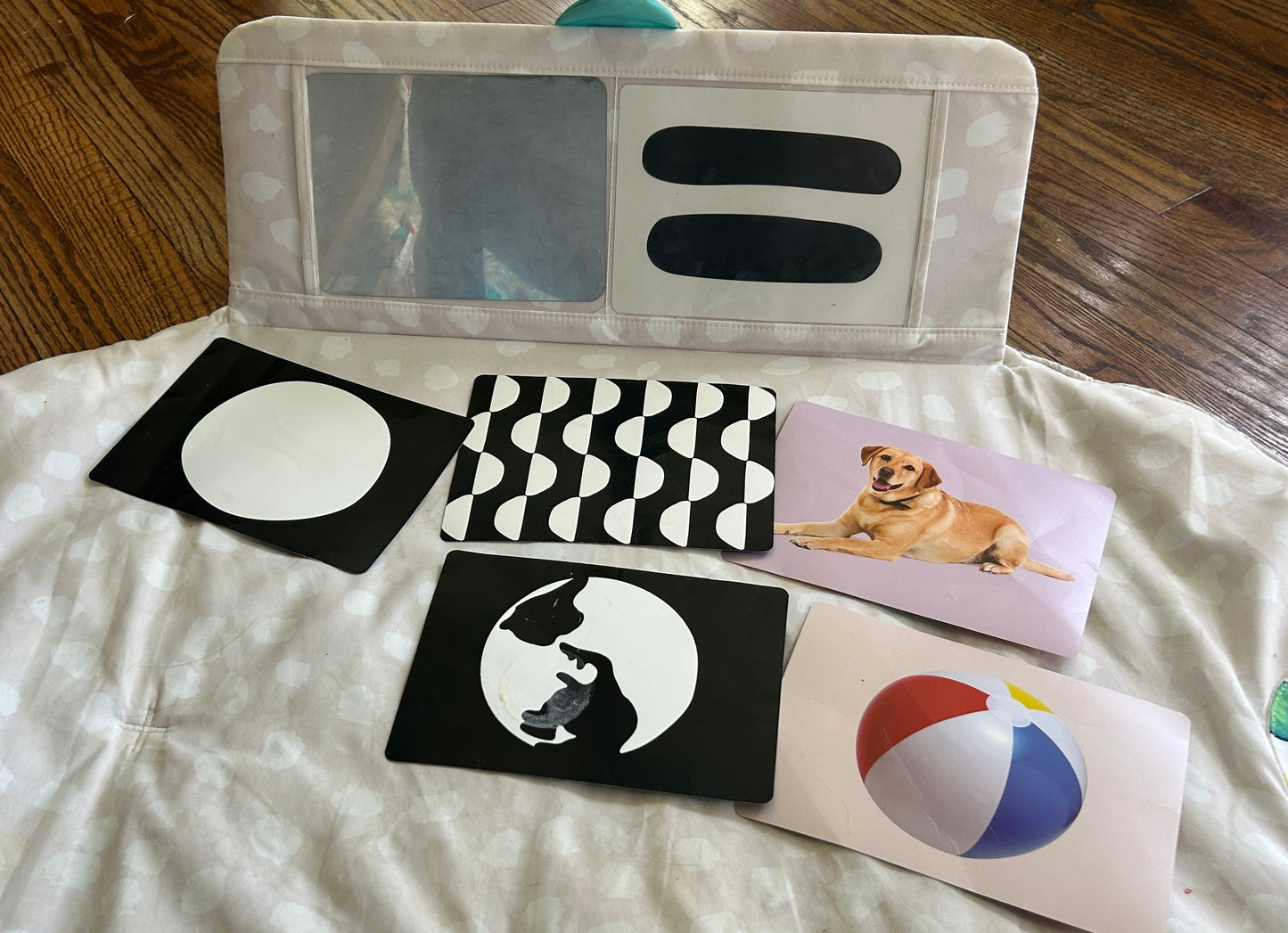 seller #35 lovevery playmat with cards and sensory book