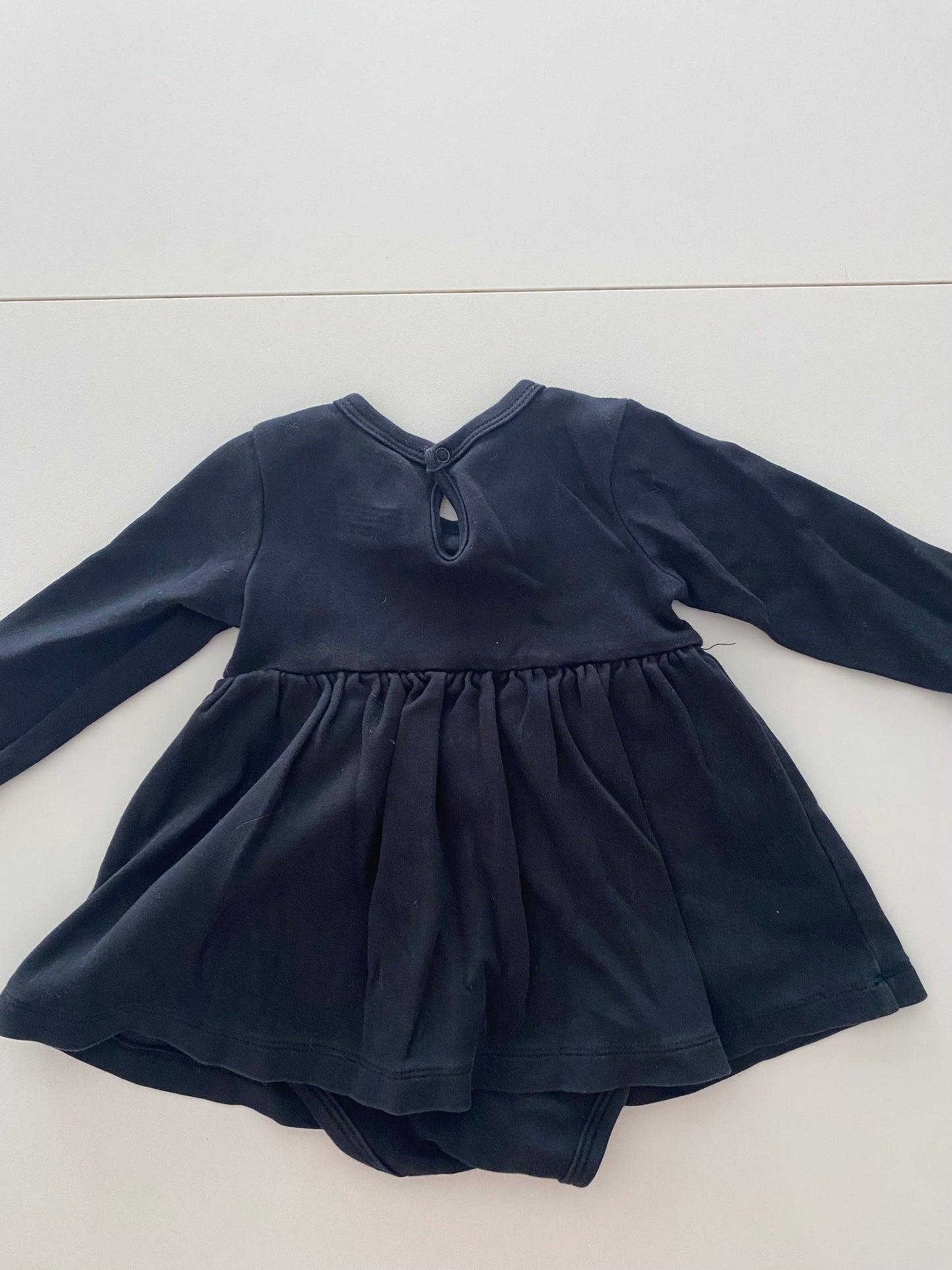 #117- Girls 12M, Primary black onesie dress, VGUC,*reduced*