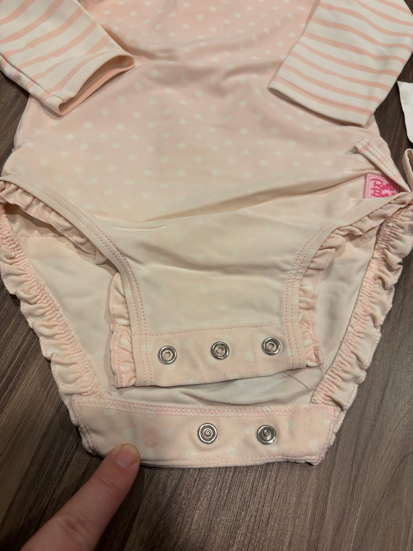 #77 - 12-18 Mo - GUC RuffleButts - Pink Dot Rashguard (bottom missing one button - still closes)