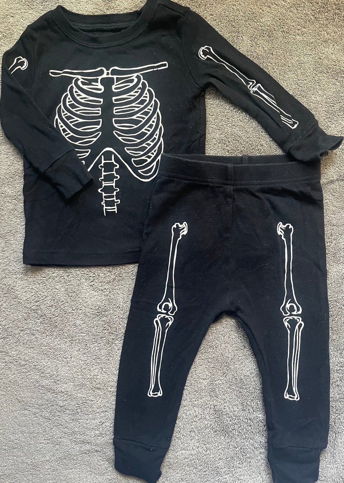 Seller #13 Old Navy gender neutral 12-18 months skeleton two piece pajamas